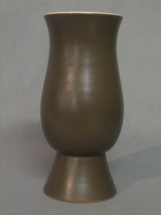 A waisted brown glazed Poole Pottery vase, the base with Dolphin mark and impressed 704 10"
