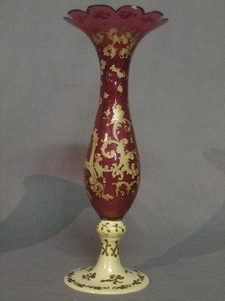 A Victorian red overlay glass vase, raised on a replacement plaster vase 15" (some chips)