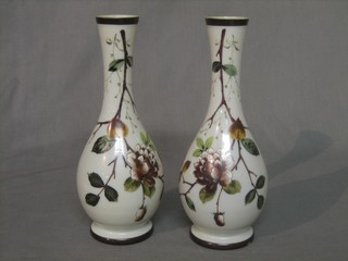 A pair of 19th Century club shaped opaque glass vases with floral decoration 10" 