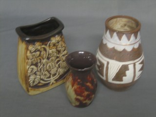 A boat shaped vase 5", an Art Pottery vase 7" and a small Ewenny vase 6"