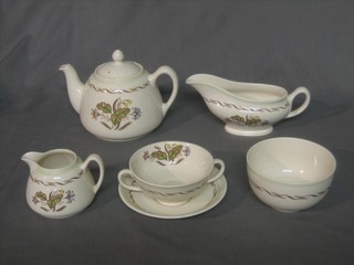 A 27 piece Royal Doulton Woodland pattern dinner service comprising meat plate 13", do. 11", 6 dinner plates 10", 6 side plates 8 1/2", 6 saucers, 3 twin handled soup bowls, sauce boat, sugar bowl, cream jug and teapot