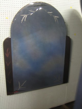 An Art Deco arched, bevelled plate and etched glass mirror 32"