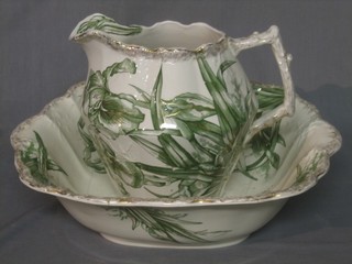 A green and floral patterned jug and bowl set (bowl cracked)