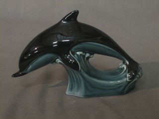 A Poole Pottery figure of a diving Dolphin 6"