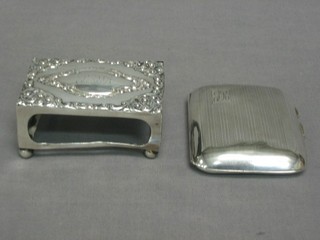 An embossed silver match box cover and a silver cheroot case, 2 ozs