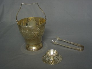 An engraved silver plated ice pail with tongs