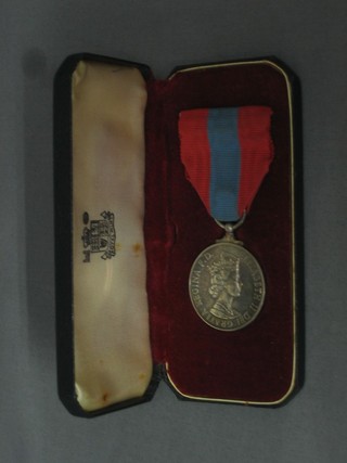 Elizabeth II issue Imperial Service medal to Richard Walker, cased