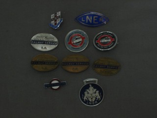 An  oval blue enamelled LNER badge, 3 Southern Railway service badges, an LNER service badge, an LNER enamelled badge, an LNER key ring fob, Jubilee Line enamelled badge, Northern Line do., London Transport badge