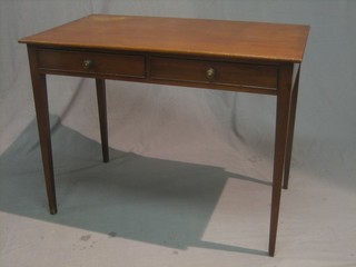 A 19th Century mahogany side table fitted 2 drawers and raised on square tapering supports 38"