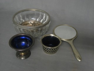A silver plated hand mirror, a glass bowl with plated mounts and other minor plated items