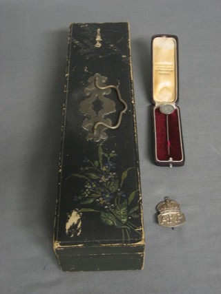 A silver ARP badge, a Victorian stick pin in the for of a coin and a Victorian glove box marked a Present From the Isle of Wight