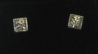 A pair of square cut diamond earrings, approx 0.55ct