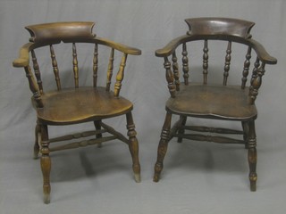 A pair of smoker's bow elm chairs 