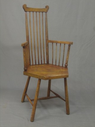 An elm Art Nouveau Voisy style stick and bar carver chair