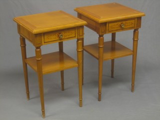 A pair of satinwood bedside cabinets fitted a drawer with undertier, raised on turned supports 15"