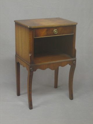A Georgian style mahogany bedside cabinet fitted a drawer above a recess, raised on splayed supports 17"