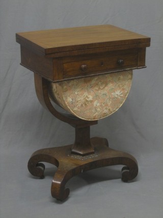 An early Victorian mahogany work/card table with flap over top, the base fitted 1 long drawer above a basket, raised on chamfered column with triform base ending in scrolled feet 20"