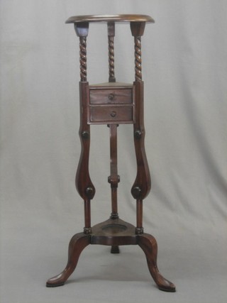 A Georgian style mahogany wig stand fitted a drawer 12"