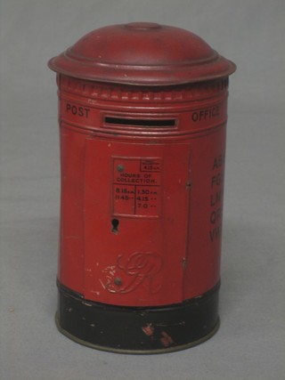 A circular metal money box in the form of a George V pillar box by Burnet Ltd. 5"