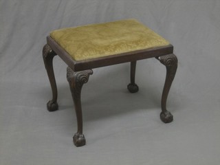 A rectangular mahogany Queen Anne style stool with upholstered drop in seat raised on cabriole supports 21"
