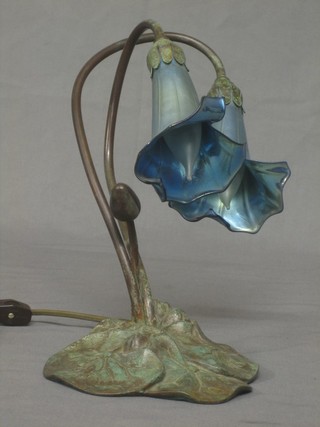An Art Nouveau style bronze and glass table lamp in the form of water lilies 14"