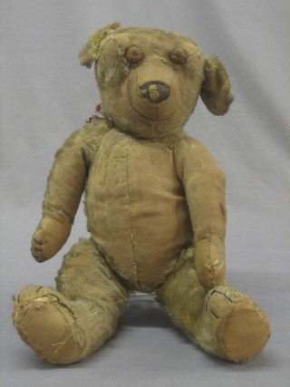 A yellow teddy bear with articulated limbs 17"