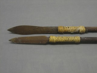 2 steel spear heads 9" on turned wooden shafts