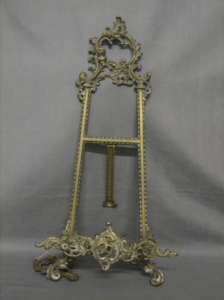 A 19th Century pierced gilt metal easel (f) 20"