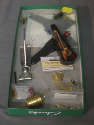 A dolls house upright vacuum cleaner, a fire side companion set, a violin and case etc