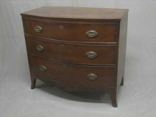 A Georgian mahogany bow front chest with crossbanded top, fitted 2 long and 2 short drawers and raised on splayed bracket feet 40"