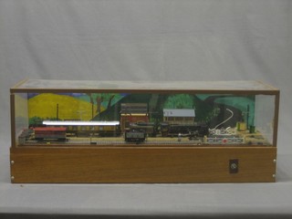 A Railway display with locomotive Evening Star and tender, various signal box, water tower, coal store etc 32" x 10"