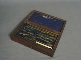 A 19th Century geometry set contained in a rosewood case