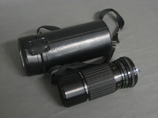 A Sigma 100-200mm zoom lens with case