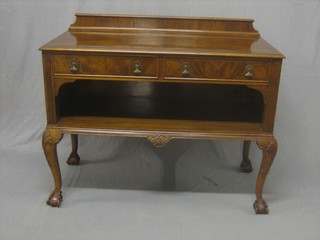 A Queen Anne style walnut serving table with raised back, the base fitted 2 drawers above a recess, raised on cabriole, ball and claw supports 45"