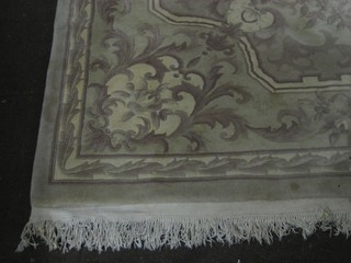 A cream and floral patterned Chinese carpet  144" x 109"