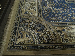 A blue ground Persian style carpet 163" x 134"