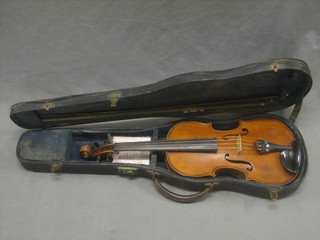 A violin with 14 1/2" back and labelled J T L Dulls et Forties complete with bow and carrying case