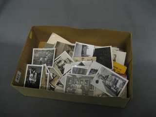 A quantity of black and white photographs etc