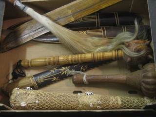 A collection of Eastern wooden clubs etc