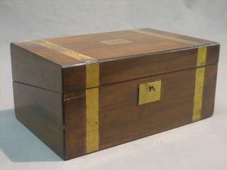 A 19th Century mahogany and brass banded writing slope with hinged lid 14"