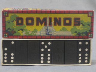 A set of Coca Cola dominoes, the lid marked For Victory by United States Savings Bonds and Shares