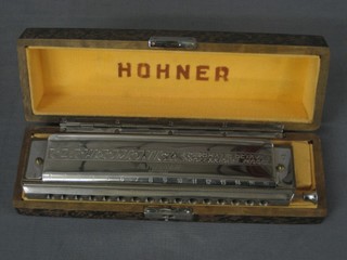 A Hohner 64 harmonica