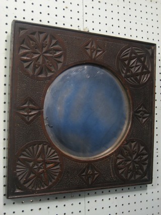 A circular convex plate mirror contained in a carved oak frame 142