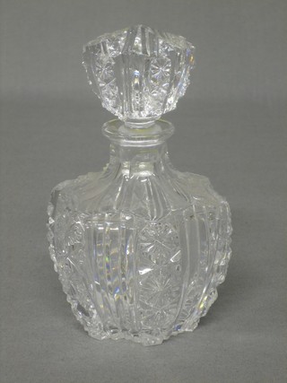A cut glass club shaped perfume bottle and stopper 5"