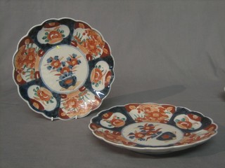 A pair of 19th Century Japanese Imari porcelain plates with panelled and floral decoration 9"