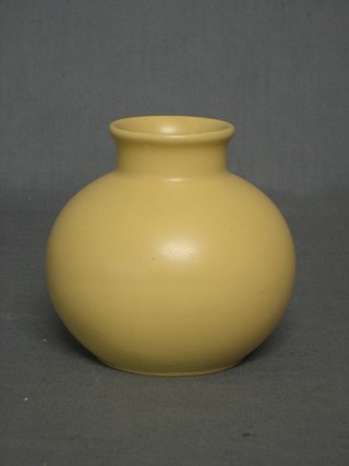 A yellow glazed Poole Pottery vase, the base with dolphin mark 4"