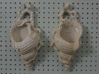 A pair of Worcester blanc de chine wall pockets in the form of shells