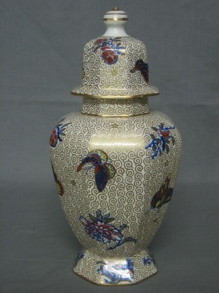 A 19th Century pottery tobacco jar in the form of a Blackamoor 6" (lid chipped)