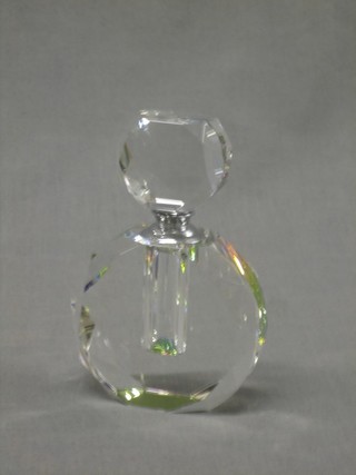 A circular Art Deco style shaped clear glass scent bottle and stopper, 5", boxed