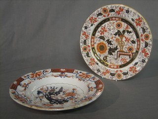 A circular Masons Ironstone china soup bowl with chinoiserie decoration the base with black Masons mark and F Morley & Co 10" and 2 Ironstone china Derby style plates impressed Ashworth Real Ironstone china 10"